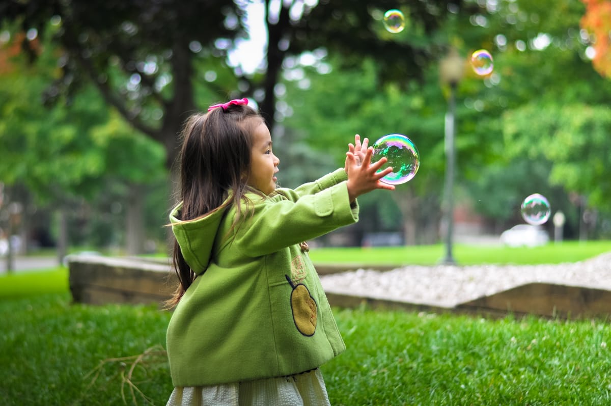 child with bubbles